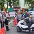 Naik Motor, Dirlantas Polda Riau Jadi Sosok di Balik Lancarnya Pacu Jalur Kuansing 2025