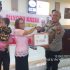 Kali Ini Personil Polsek Minas – Polres Siak Sambangi Jemaat Gereja GBI ICC Rayon XI Minas & Berikan Bantuan Sembako