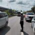 Hujan Tak Hentikan Personel Ditlantas Polda Riau Urai Kemacetan di Pekanbaru